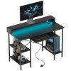 HOMCOM Computer Desk with LED Lights and Power Outlets, 120 x 55 cm Gaming Desk with Monitor Stand, Sliding Keyboard Tray and Storage Shelves for Home Office, Black