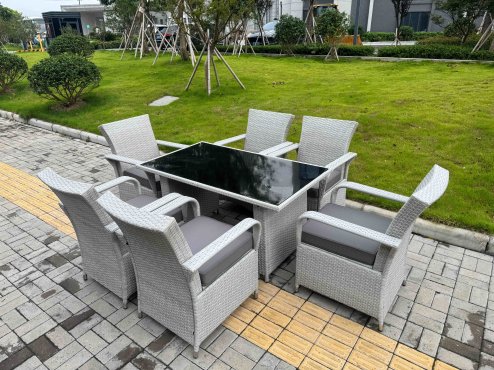Fimous Light Grey Rattan Outdoor Garden furniture Set Black Tempered Glass Dining Table and 6 Chairs Set with Seat Cushion